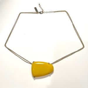 Kendra Scott necklace with yellow center stone